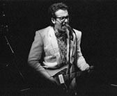 A photo of Elvis Costello.