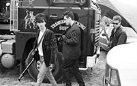 The Smiths with a fan backstage at Glastonbury 1984